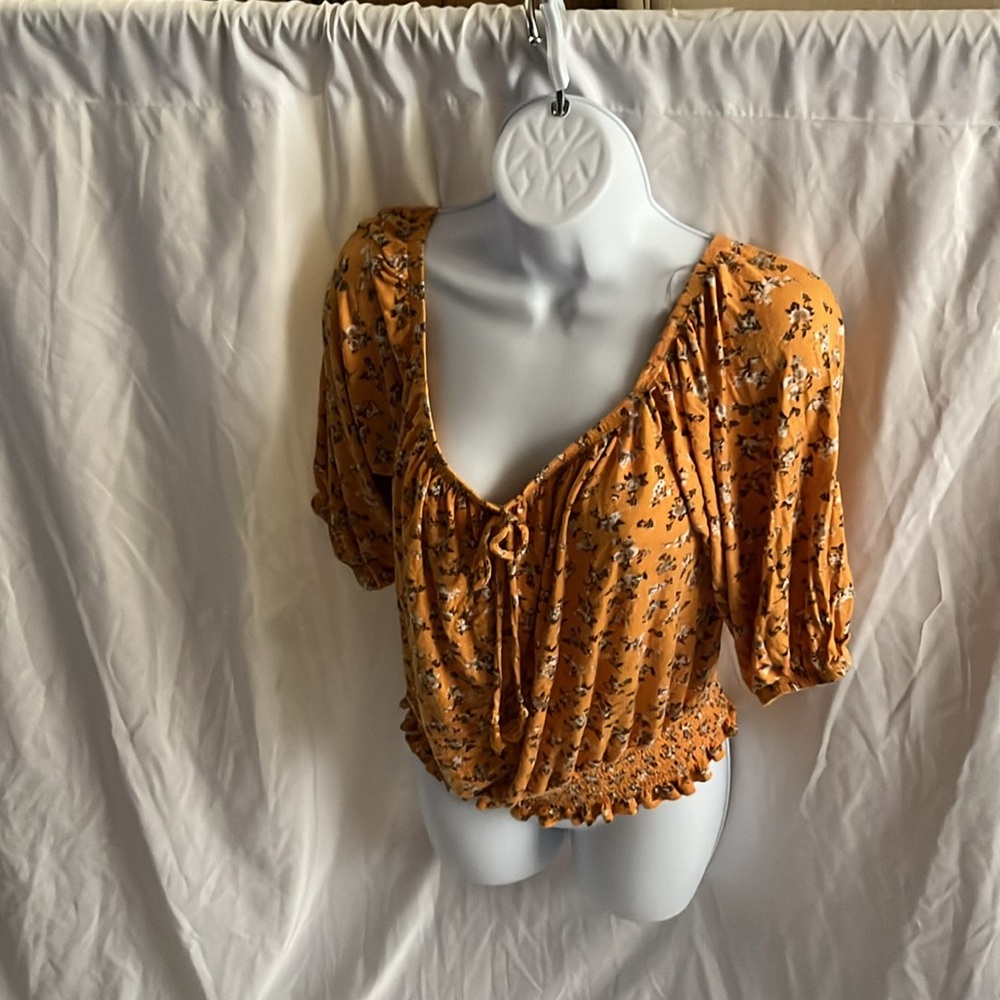 Gold top with flowers